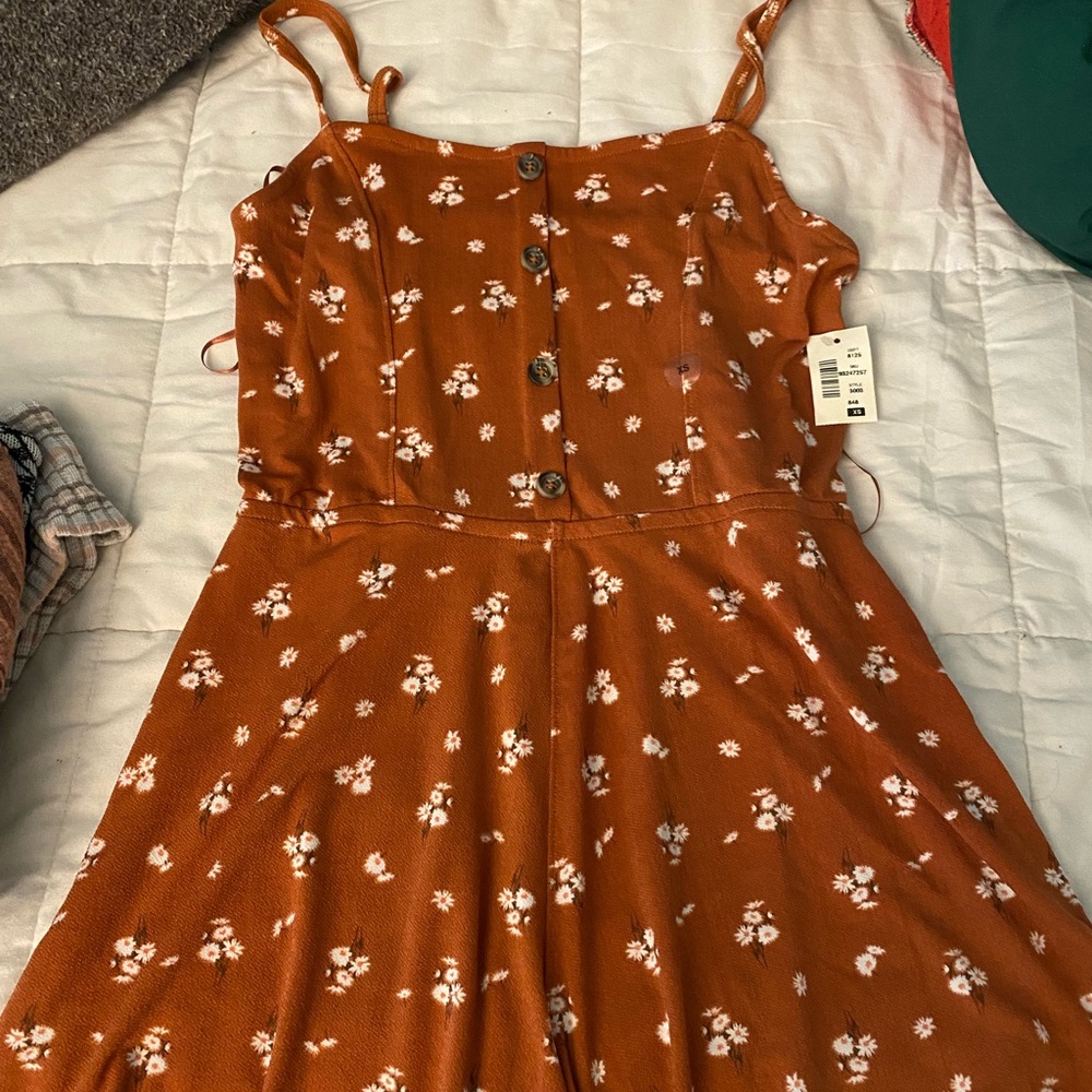 One piece suit, never used, brand new